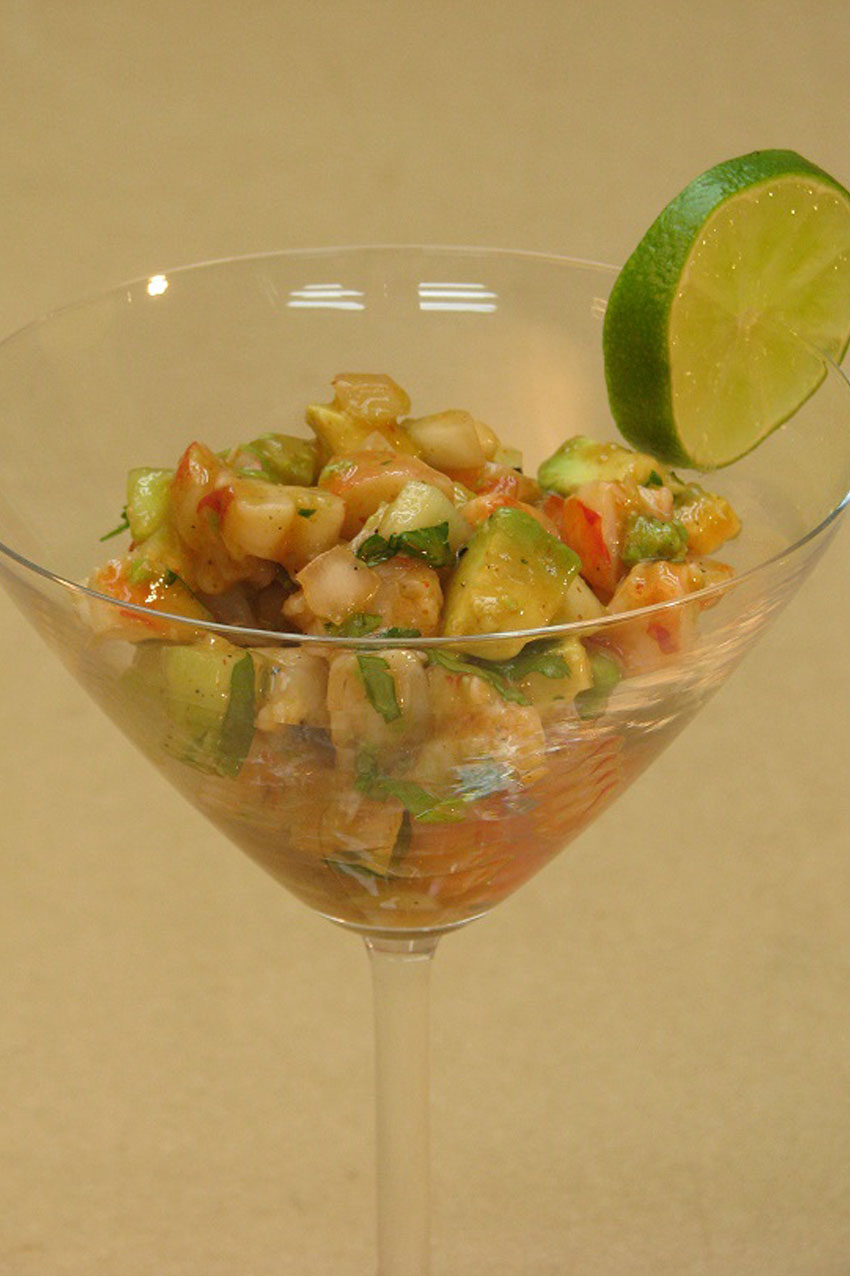 Mexican shrimp ceviche with cucumber, avocado and hot sauce