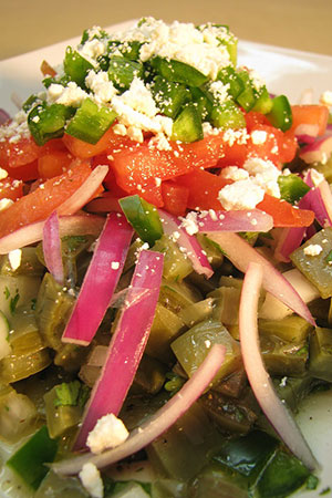 Mexican cactus salad with jalapeños, oregano and lime juice