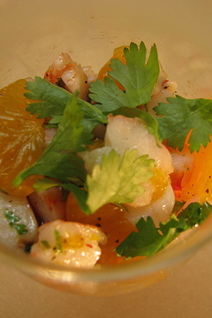 Mexican shrimp ceviche with mandarin oranges, capers and roasted poblano chiles