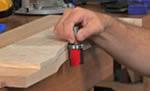 Template Routing by Hand-Held Router